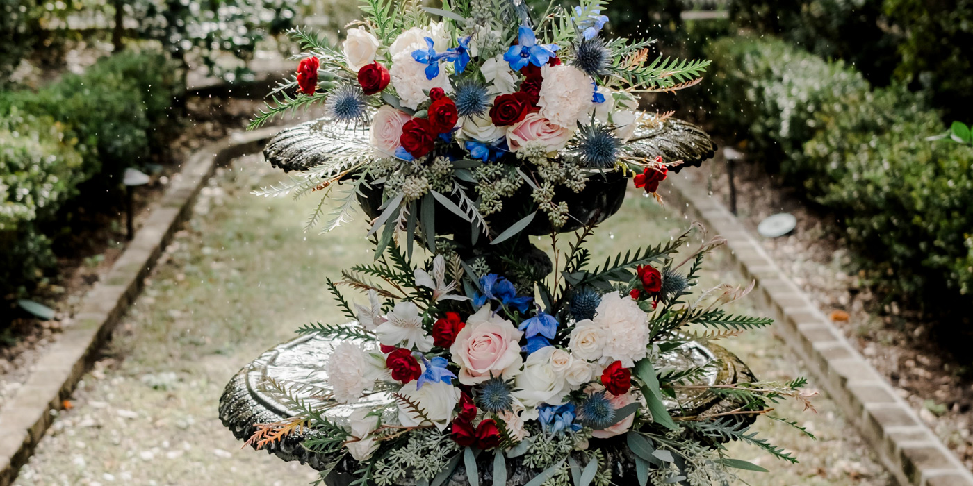 a fountain with flowers