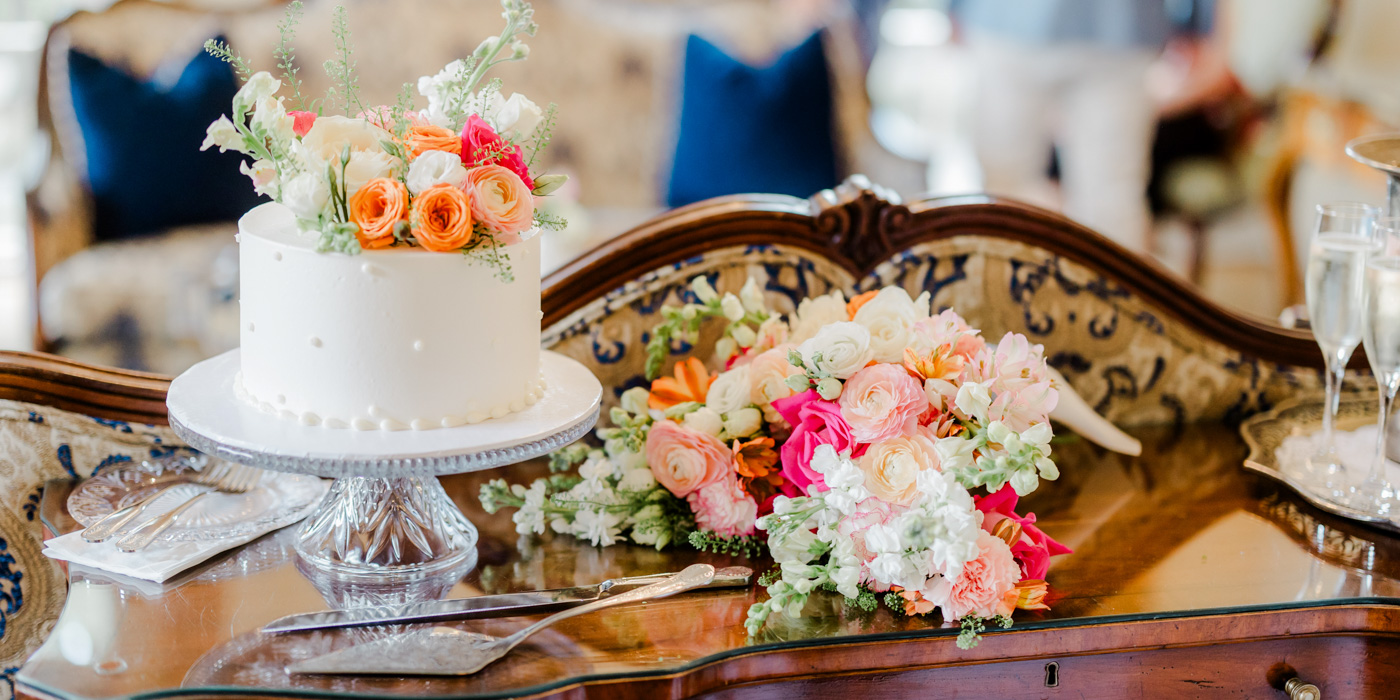 a cake and flowers on a table